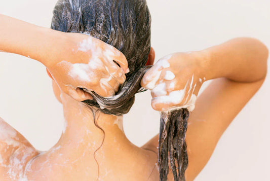 Washing hair with MooGoo's gentle scalp care range