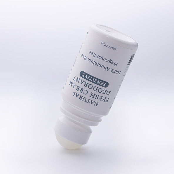 Fragrance free MooGoo deodorant shown open, eco-friendly aluminium free roll-on designed for delicate underarms and clean body care routines