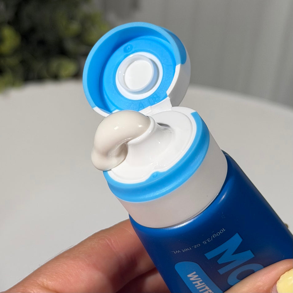 MooGoo Natural Moothpaste whitening peppermint toothpaste in bathroom, fluoride-free toothpaste with hydroxyapatite for dental health