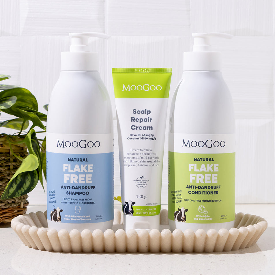 MooGoo Scalp Repair Pack on a basket, including natural shampoo, conditioner and scalp cream for dandruff and seborrheic dermatitis, gentle on sensitive scalps.