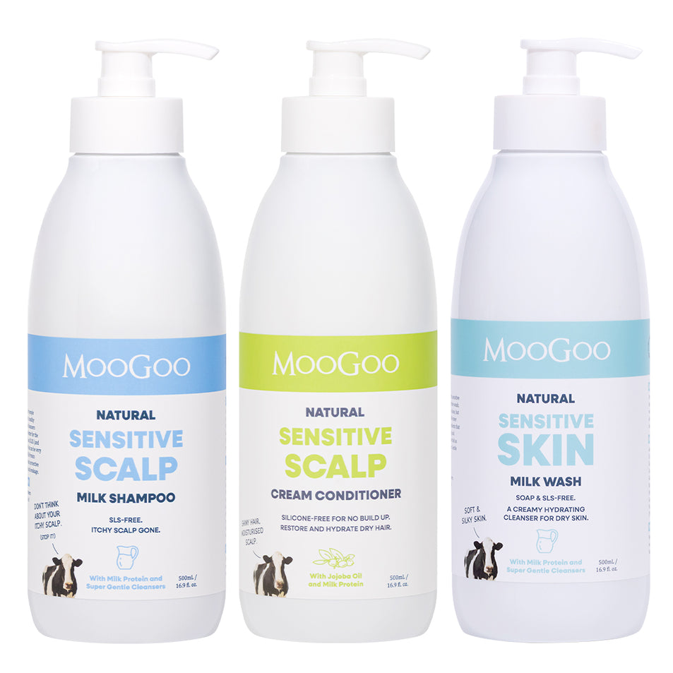 Three white bottles of MooGoo skincare on a white background. Natural Sensitive Scalp Shampoo, Natural Sensitive Scalp Conditioner and Natural Sensitive skin Milk Wash to complete a natural gentle shower routine. 